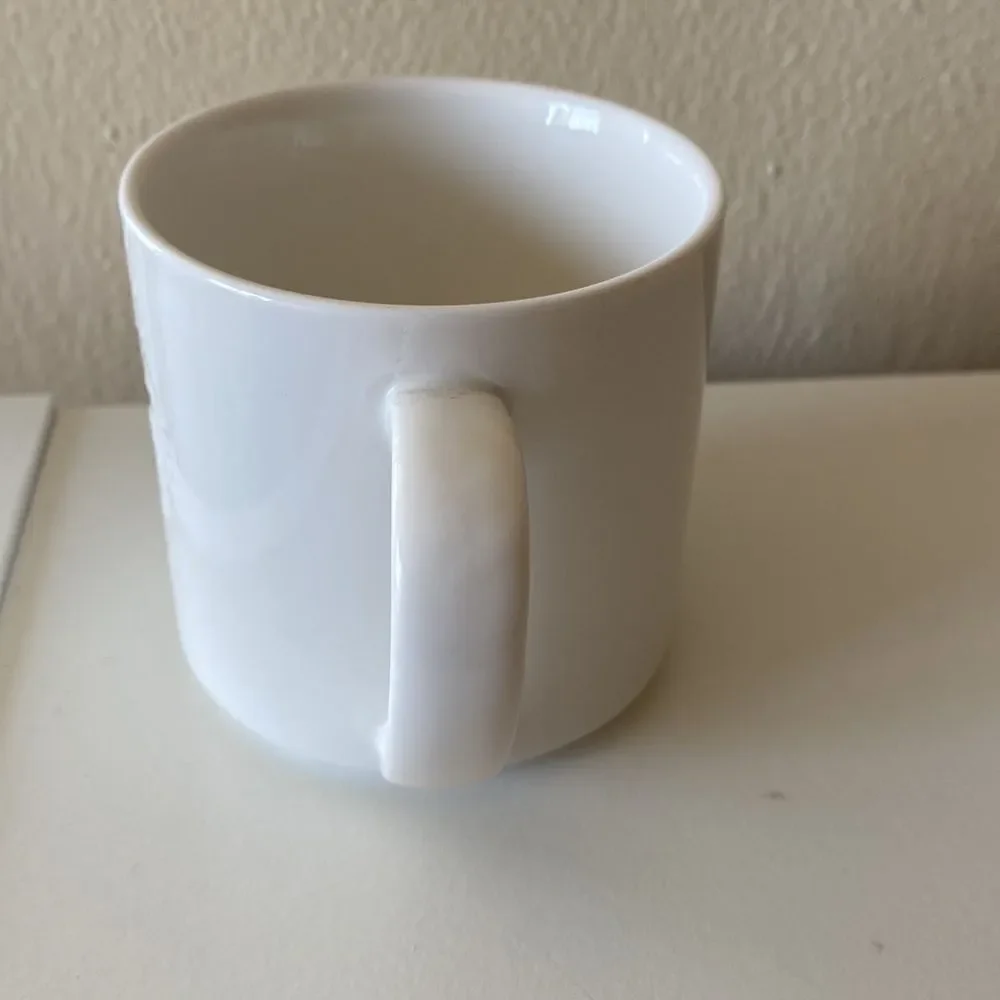 Starbucks 2014 White Embossed Coffee Cup Mug 12oz